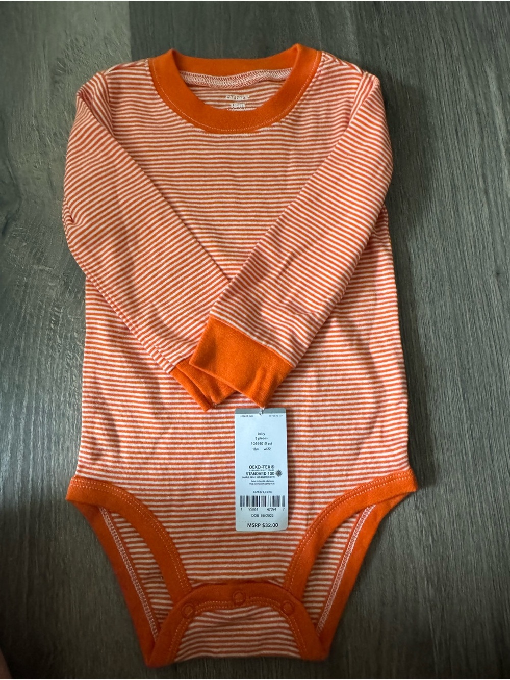 Carter’s 18m long sleeved onsie